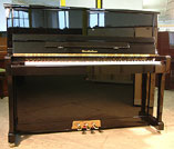 A brand new Wendl & Lung Model 122 upright piano with a black case and polyester finish. A brand new Wendl & Lung Model 122 upright piano with a black case and polyester finish.