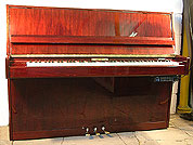 A Schaefer upright piano with a mahogany case and polyester finish. Fitted with a Piano Disk GT- QuietTime system allowing silent play via headphones. A Schaefer upright piano with a mahogany case and polyester finish. Fitted with a Piano Disk GT- QuietTime system allowing silent play via headphones.