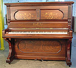 An antique, Steinway upright piano with an inlaid, rosewood case. Piano has been restored. An antique, Steinway upright piano with an inlaid, rosewood case. Piano has been restored.