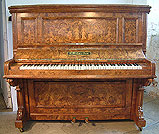 A Bishop upright piano with an intricately inlaid walnut case. Inlaid with grecian ladies, cherubs and musical intruments. A Bishop upright piano with an intricately inlaid walnut case. Inlaid with grecian ladies, cherubs and musical intruments.