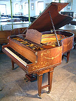Artcase, Schiedmayer Grand Piano For Sale with an Adams Style, Inlaid Rosewood Case Inlaid, Schiedmayer grand piano for sale. Inlaid with a variety of woods with swags, flowers.