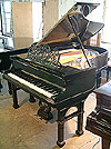 An antique Bluthner grand piano with a polished, black case formerly owned by Arthur Bliss. An antique Bluthner grand piano with a polished, black case formerly owned by Arthur Bliss.