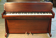 An Allison upright piano with a polished mahogany case An Allison upright piano with a polished mahogany case