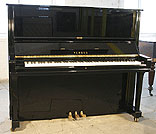 A Yamaha U3 upright piano with a black case and polyester finish. A Yamaha U3 upright piano with a black case and polyester finish.