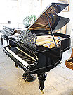 A restored, antique Bluthner grand piano with a polished, black case A restored, antique Bluthner grand piano with a polished, black case