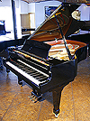 A pre-owned Boston GP 193 grand piano with a black case and polyester finish. Designed by Steinway and Sons. Bigger soundboard area creates a bigger sound. Lower tension scaling produces a longer sustain. Soundboard made from Sitka spruce for superior tone and volume. Pinblock made from Wisconsin hard maple. Bass strings wound with solid copper and overstrung. Treble strings made from Roslau wire from Swedish steel. Features a soft fall keyboard lid. A pre-owned Boston GP 193 grand piano with a black case and polyester finish. Designed by Steinway and Sons. Bigger soundboard area creates a bigger sound. Lower tension scaling produces a longer sustain. Soundboard made from Sitka spruce for superior tone and volume. Pinblock made from Wisconsin hard maple. Bass strings wound with solid copper and overstrung. Treble strings made from Roslau wire from Swedish steel. Features a soft fall keyboard lid.