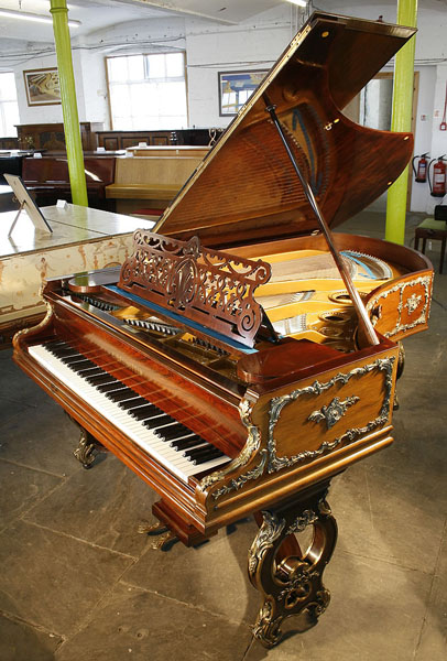 An 1897 , Bechstein grand piano with a rosewood case in Louis XV, rococo style