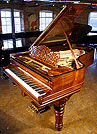 A restored Steinway Model B grand piano with an exquisite rosewood case. This piano has been restored. A restored Steinway Model B grand piano with an exquisite rosewood case.