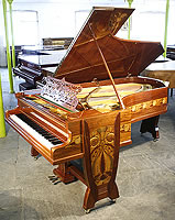 Stunning, art nouveau, Bechstein Model C grand piano with a french polished, beautiful mahogany case inlaid with a variety of woods Stunning, art nouveau, Bechstein Model C grand piano with a french polished, beautiful mahogany case inlaid with a variety of woods.