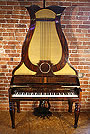 An antique Klein lyre piano with a rosewood case An antique Klein lyre piano with a rosewood case.