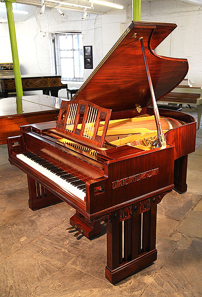 A 1916, Arts and Crafts Ibach grand piano with a mahogany case. Designed by Dutch Architect Pierre Joseph Hubert Cuypers
