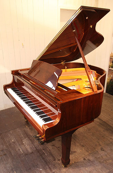 Brand new Steinhoven Model 160 baby grand piano with a mahogany case and brass fittings. Piano has an eighty-eight note keyboard and a three-pedal lyre.