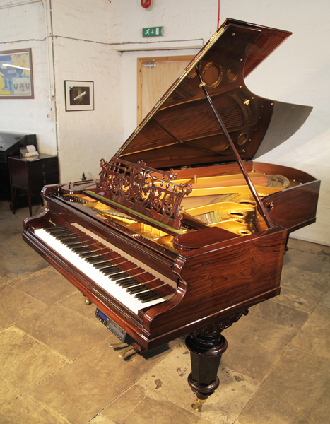 Antique, 1885, Bechstein Model D  Grand piano for sale with a polished, rosewood case and turned legs. Piano features a fitted PianoDisc Symphony Pro 228 CFX system