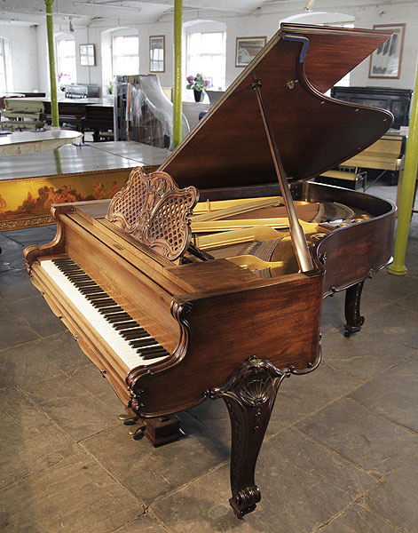 A 1902, Bluthner grand piano for sale with a carved, Rococo style rosewood case and carved, cabriole legs