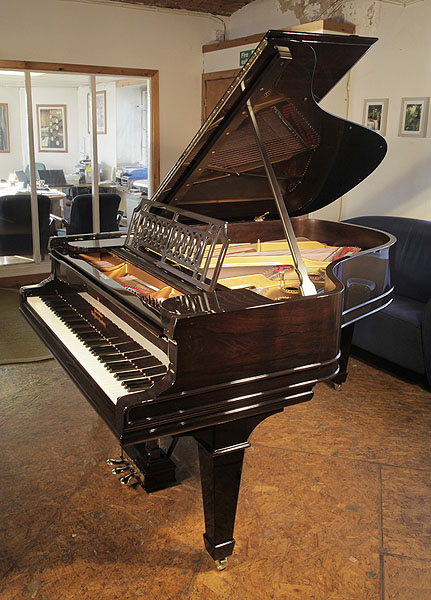 A 1909, Steinway Model A grand piano for sale with a rosewood case, geometric cut-out music desk and spade lsegs
