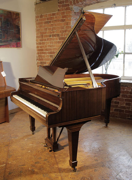 A 1975, Steinway Model O grand piano for sale with a mahogany case and spade legs. Piano has an eighty-eight note keyboard and a two-pedal lyre.