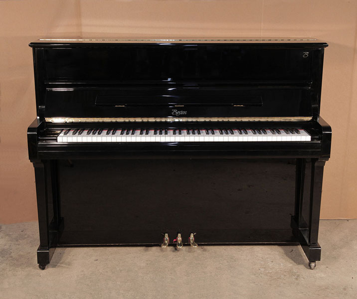 Reconditioned, 2004, Boston UP-118 Upright Piano For Sale with a Black Case and Brass Fittings. Piano has an eighty-eight note keyboard and three pedals