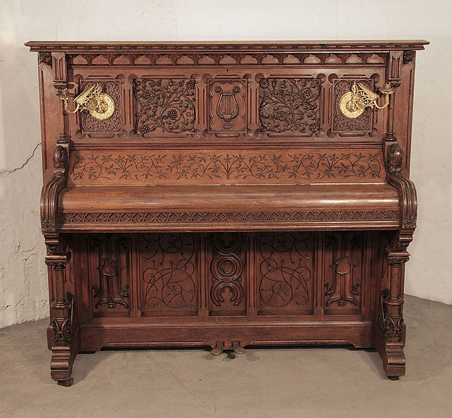 Renaissance style, Gebruder Knake upright piano for sale with an ornately carved, oak case