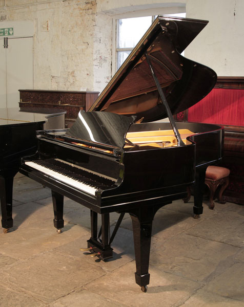 Pre-owned, 1926, Steinway Model O grand piano with a black case and spade legs. Piano has an eighty-eight note keyboard and a two-pedal lyre.  