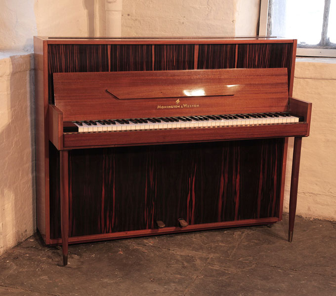 Mid Century Modern style, 1956, Monington and Weston upright piano for sale with a contrasting mahogany and macassar ebony case. Piano has an eighty-five note keyboard and two pedals.