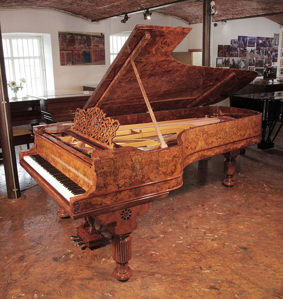Rebuilt, 1881, Steinway & Sons Model D concert grand piano with an exquisite, burr walnut case and brass fittings. Piano has been rebuilt in Germany by Steinway Academy trained technicians using 100% Steinway parts 