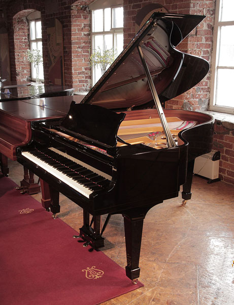 Rebuilt, 1969, Steinway Model O grand piano for sale with a black case and spade legs.  Piano has been rebuilt in Germany by Steinway Academy trained technicians using 100% Steinway parts 