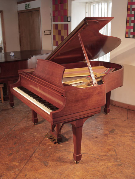 Reconditioned, 1966, Steinway Model L grand piano for sale with a polished, sapele mahogany case and spade legs. Piano has an eighty-eight note keyboard and a three-pedal lyre 