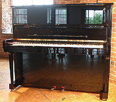 Steinway Model K upright piano for sale.