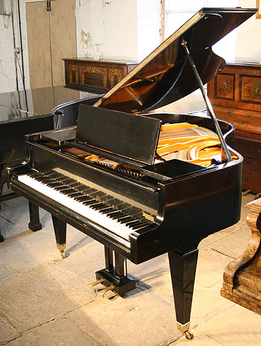 Black Bosendorfer grand Piano for sale.