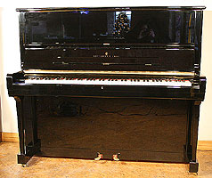 Black Steinway model K upright piano for sale.