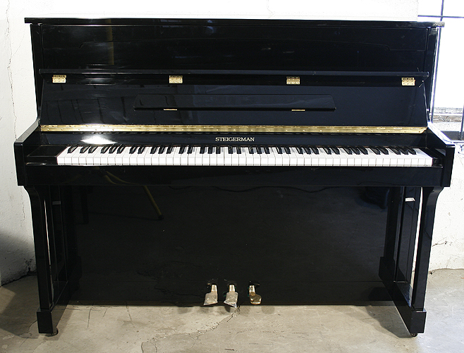Steigerman upright Piano for sale.