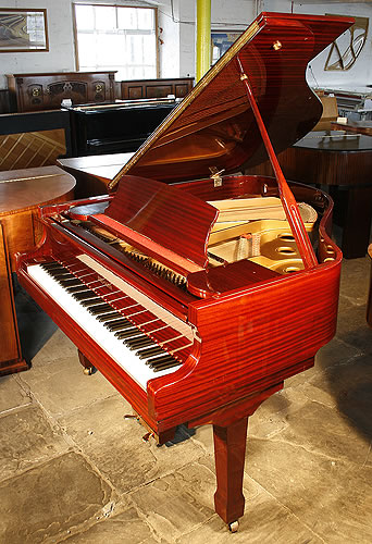 Reid Sohn baby grand Piano for sale with a mahogany case and polyester finish.