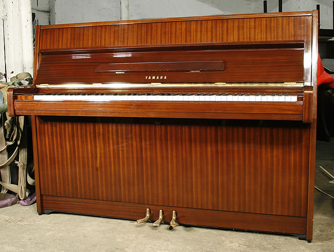 Yamaha upright Piano for sale.