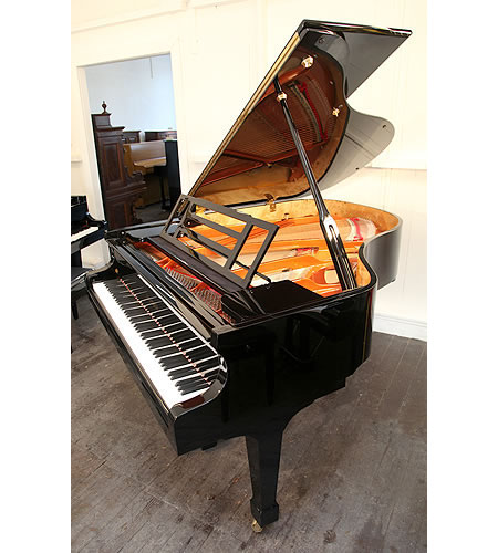 Brand new, Feurich Model 178 Professional grand piano with a black case and brass fittings. Piano has an eighty-eight note keyboard and a three-pedal piano lyre. 