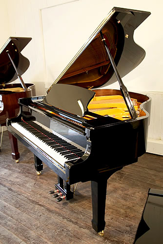 Brand new, Steinhoven Model 160 baby grand piano with a black case and polyester finish. Piano has an eighty-eight note keyboard and a three-pedal piano lyre.