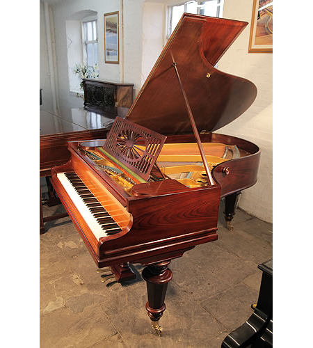 Restored, Bechstein Model A grand piano with a polished, rosewood case and turned faceted legs. Piano has an eighty-five note keyboard and a two-pedal lyre. 