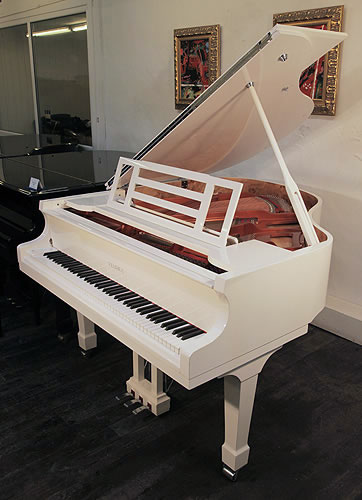 Brand new, Feurich Model 161 Professional grand piano with a white case and chrome fittings. Piano has an eighty-eight note keyboard and a three-pedal piano lyre. 