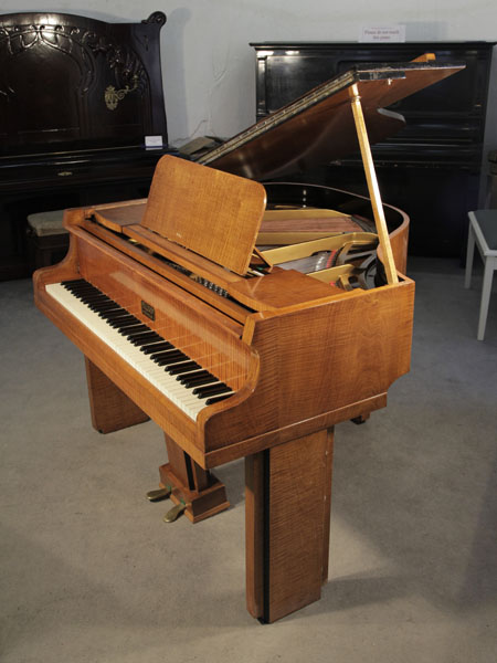 A 1939, Art Deco Allison baby grand piano with a polished satinwood case. Legs and lyre feature strong geometric styling