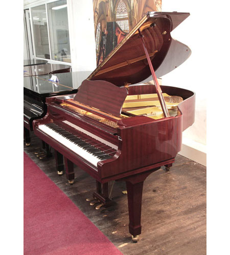 Reconditioned, 1989, Yamaha G1 baby grand piano with a mahogany case and spade legs