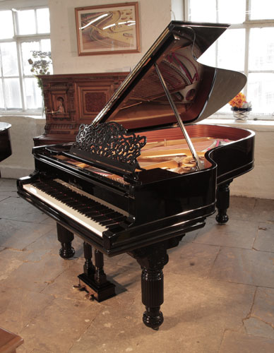 Rebuilt, 1886, Steinway Model B grand piano for sale with a black case and  fluted, barrel legs. Piano has an eighty-five note keyboard and a two-pedal lyre