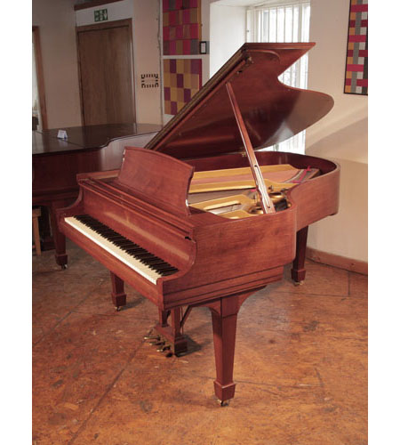 Reconditioned, 1966, Steinway Model L grand piano for sale with a polished, sapele mahogany case and spade legs. Piano has an eighty-eight note keyboard and a three-pedal lyre. 