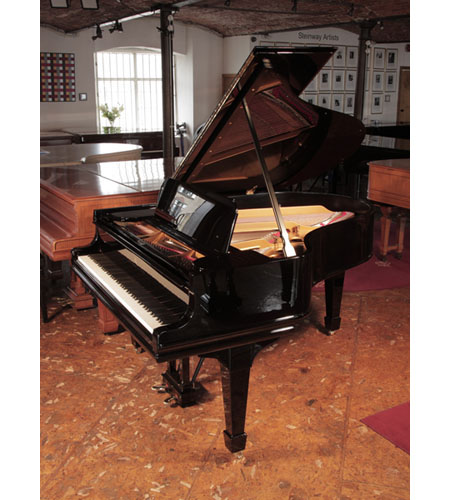 Rebuilt, 1910, Steinway Model O grand piano for sale with a black case and spade legs. Piano has an eighty-eight note keyboard and a two-pedal lyre. 