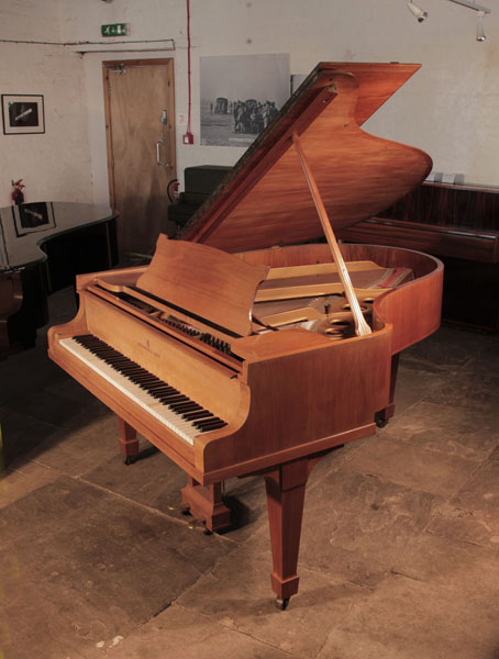 Reconditioned, 1932, Steinway Model O grand piano for sale with a satin, walnut case and spade legs.  Piano has an eighty-eight note keyboard and a two-pedal lyre