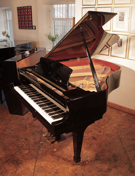 Reconditioned, 1993, Boston GP178 grand piano for sale with a black case and spade legs. Piano has an eighty-eight note keyboard and a three-pedal lyre.