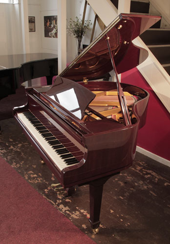 Reconditioned, 2007, Challen GP142 baby grand piano for sale with a mahogany gloss case. Piano has an eighty-eight note keyboard and a three-pedal lyre.