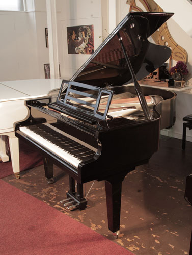  Pre-owned, 2018, Feurich Model 179 Dynamic II grand piano with a black case, chrome fittings and square tapered legs. Piano music desk features an adjustable LED strip light to illuminate sheet music. Piano has an eighty-eight note keyboard and a three-pedal piano lyre. 
  