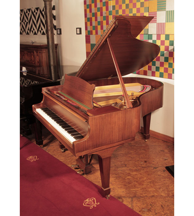 Restored, 1961, Steinway Model M grand piano with a satin, walnut case and spade legs 
