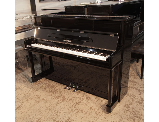 As new, 2020, Besbrode SU112 upright piano for sale with a black gloss case and chrome fittings