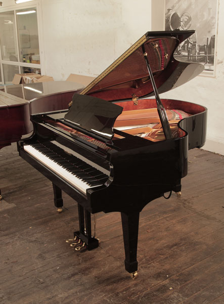 Edelweiss G66 grand piano for sale with a black gloss case and fitted iQ Pianodisc player system. Piano has a three-pedal lyre and an eighty-eight note keyboard. 