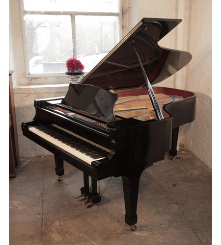 A 1981, Kawai KG-5D grand piano for sale with a black gloss case and spade legs.  Piano has an eighty-eight note keyboard and a three-pedal lyre. 